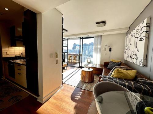 Posezení v ubytování Chic 1 Bedroom City Centre Apartment