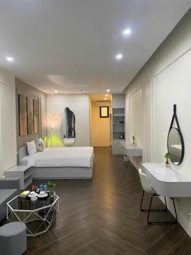 En eller flere senge i et værelse på DD hotel