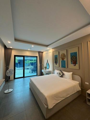 En eller flere senge i et værelse på DD hotel