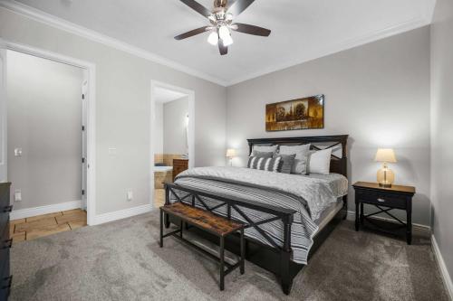 a bedroom with a bed and a ceiling fan at Pool & Sunshine Retreat - Resort-style Amenities in Hurricane