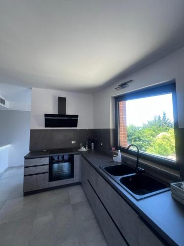 Una cocina o zona de cocina en In My Place
