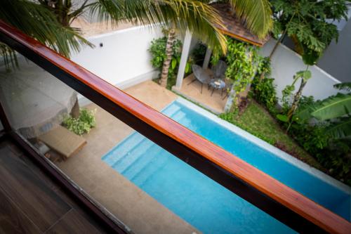 an overhead view of a swimming pool in a house at Emerald Villas by Paje Emerald Escapes Ltd in Paje