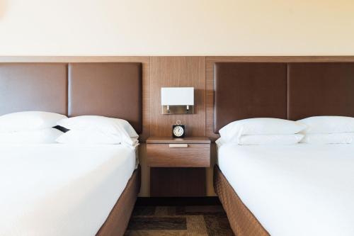 Ένα ή περισσότερα κρεβάτια σε δωμάτιο στο Belfast Harbor Inn