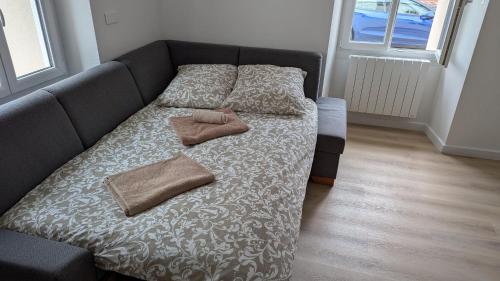 Ένα ή περισσότερα κρεβάτια σε δωμάτιο στο Residence Antonin