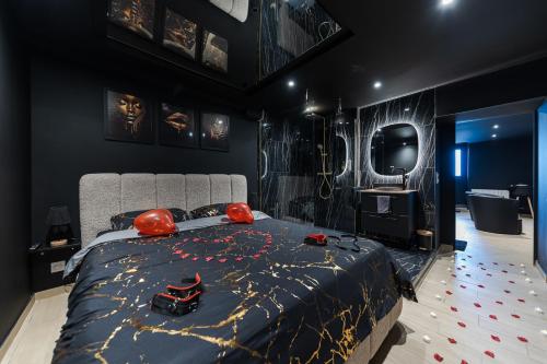 En eller flere senge i et værelse på SecretBlackRoom