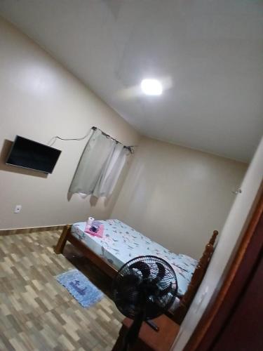 Postel nebo postele na pokoji v ubytování Pousada Criativa