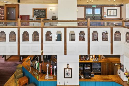 an overhead view of a bar in a restaurant at Sparrow Hotel in Ansty