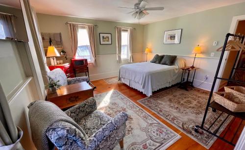 a bedroom with a bed and a living room at Jamaicahaus in Jamaica