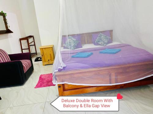 a bedroom with a bed with purple sheets and pillows at The Rock Face in Ella