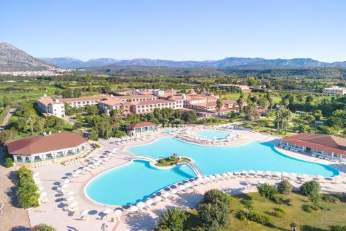 an aerial view of a resort with two swimming pools at Club Hotel Marina Beach in Orosei