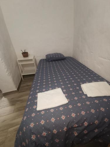 Ένα ή περισσότερα κρεβάτια σε δωμάτιο στο Ca' Navarro