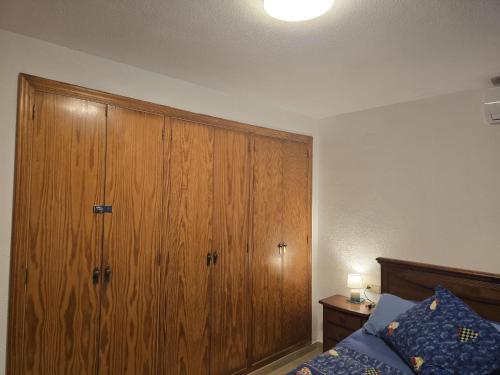 Ένα ή περισσότερα κρεβάτια σε δωμάτιο στο The Garden RA Floor Private Rooms, Pool, Garden Access
