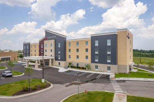 an aerial view of a hotel with a parking lot at Candlewood Suites - Detroit - Auburn Hills by IHG in Auburn Hills