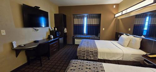Ένα ή περισσότερα κρεβάτια σε δωμάτιο στο Microtel Inn & Suites Pleasanton