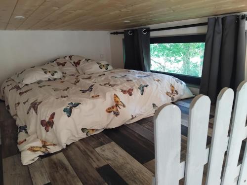 Ένα ή περισσότερα κρεβάτια σε δωμάτιο στο Tiny House