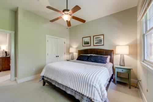a bedroom with a bed and a ceiling fan at Lake and Pool Access at Bear Lake Reserve Condo! in Tuckasegee