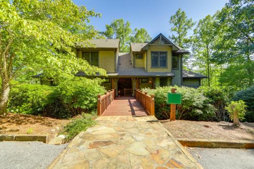 a house with a walkway in front of it at Lake and Pool Access at Bear Lake Reserve Condo! in Tuckasegee