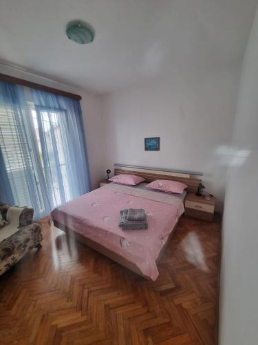Postel nebo postele na pokoji v ubytování Ivica House