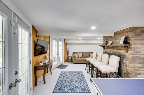 a living room with a couch and a table at Quiet Living Near Barren River Lake Spacious Home in Lucas