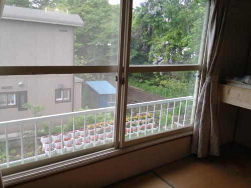 江花荘にあるバルコニーまたはテラス