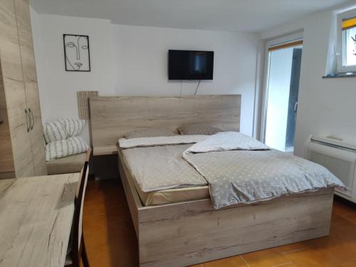 Katil atau katil-katil dalam bilik di Apartma Lastovka
