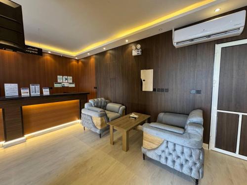 Posezení v ubytování ركن صحاري للشقق المخدومة 3 المروج Rukn Sahari for Served Apartments