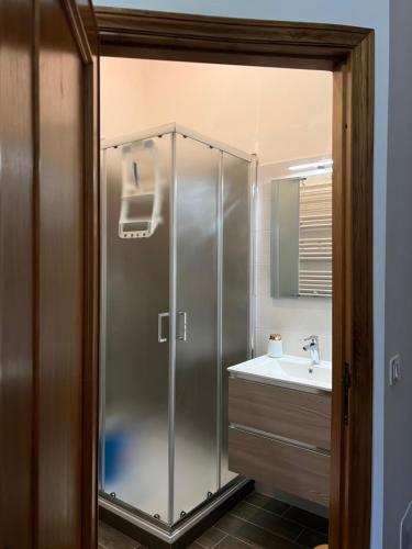 a bathroom with a shower and a sink at Trasimeno Vacanze in Passignano sul Trasimeno