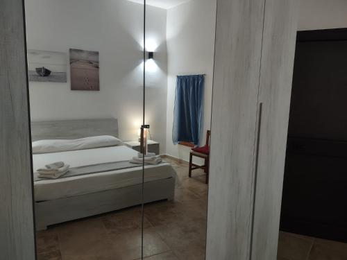 Ένα ή περισσότερα κρεβάτια σε δωμάτιο στο Casa Alisea
