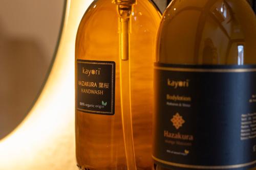 two bottles of wine sitting next to each other at Boutique Hotel Venlo in Venlo