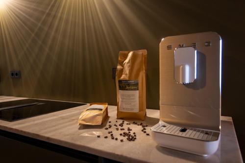 a counter with a food processor and a bag of food at Boutique Hotel Venlo in Venlo