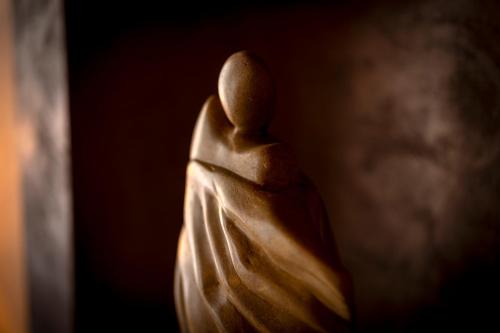 a close up of the back of a wooden statue at Boutique Hotel Venlo in Venlo