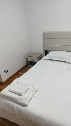 Postel nebo postele na pokoji v ubytování Vila Ciciou