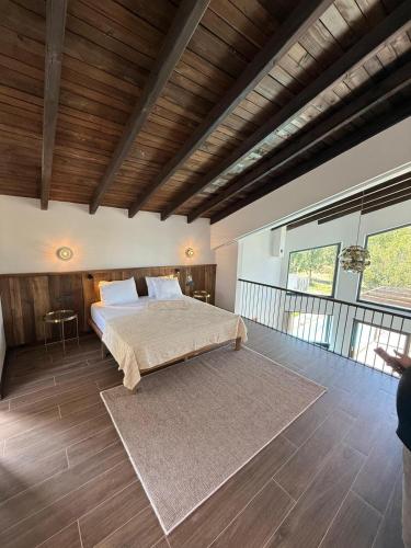 Postel nebo postele na pokoji v ubytování Cevizdibi Loft Villa