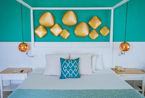 Selection Riviera Cancún- All Inclusiveにあるベッド