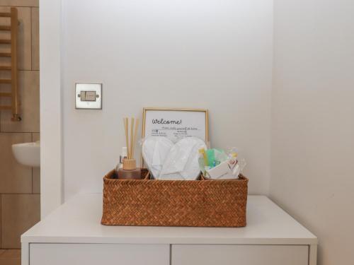 a basket of items sitting on top of a table at The Bickleigh in Tiverton