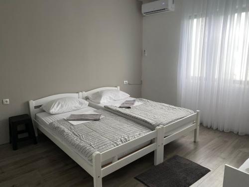 Ένα ή περισσότερα κρεβάτια σε δωμάτιο στο Rooms Nikola Rule Ostojic