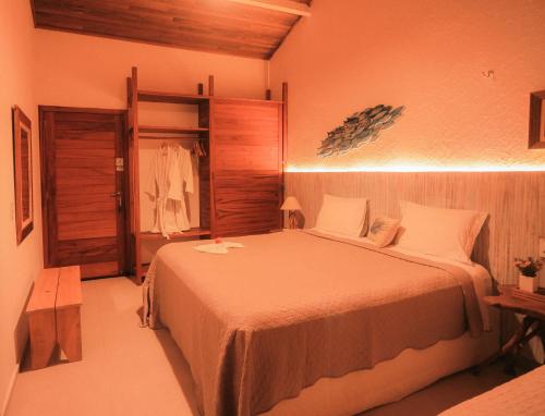 Postel nebo postele na pokoji v ubytování Casa Nossa Taiba Resort Boutique