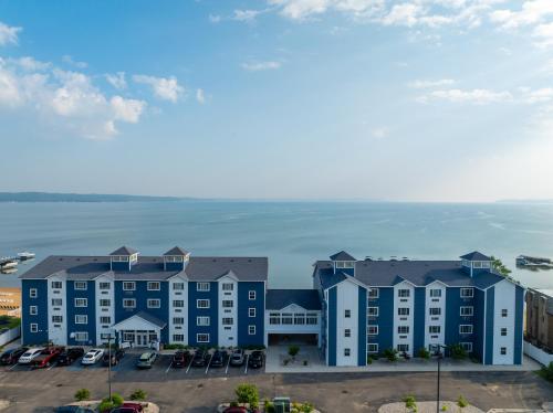 an aerial view of a building with a parking lot at The Baywatch Resort in Traverse City