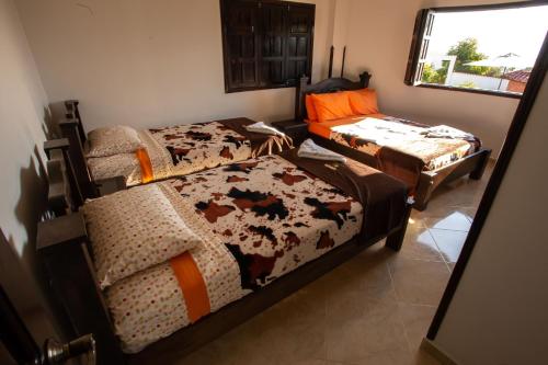 Cama o camas de una habitación en Condominio Parque Baviera