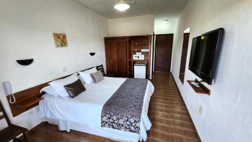 Una cama o camas en una habitación de Hotel Akropolis