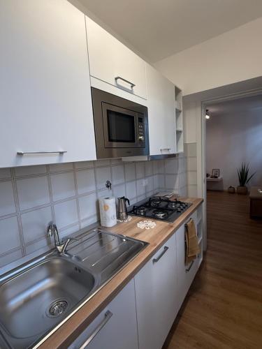 Kuchyň nebo kuchyňský kout v ubytování Casa Lea