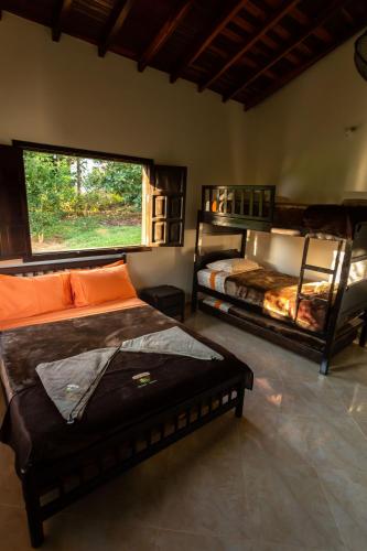 Cama o camas de una habitación en Condominio Parque Baviera