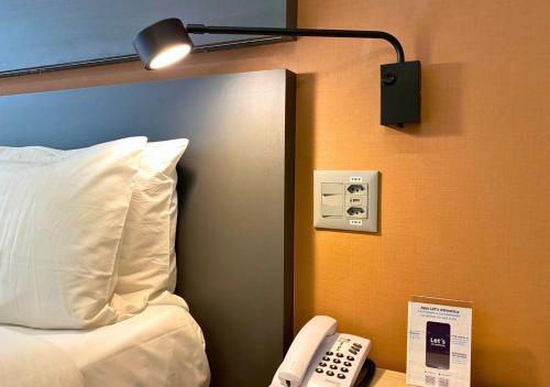 Postel nebo postele na pokoji v ubytování Quality Paulista (São Paulo, Jardins)