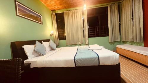 Postel nebo postele na pokoji v ubytování The Hotel Iinorri