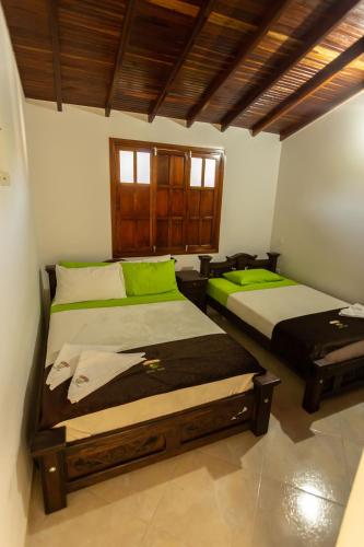 Cama o camas de una habitación en Condominio Parque Baviera