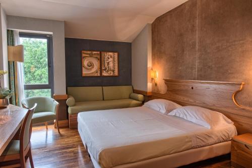 Krevet ili kreveti u jedinici u okviru objekta BV Grand Hotel Assisi
