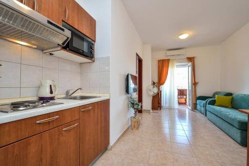 Kuchyň nebo kuchyňský kout v ubytování Apartments Bonex