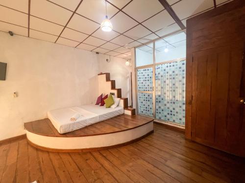 a bedroom with a bed in a room at Wilpattu Nature Resort in Murandanveli