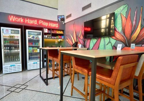 TV a/nebo společenská místnost v ubytování Quality Paulista (São Paulo, Jardins)