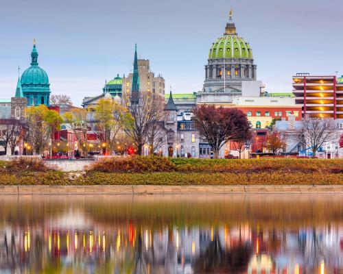 a view of a city with buildings and a body of water at BurgBnB Downtown in Harrisburg